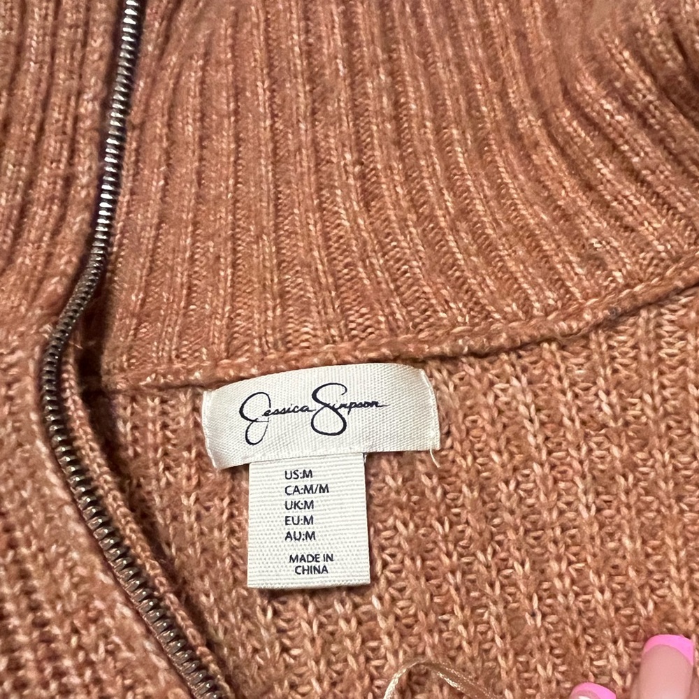 Jessica Simpson Pullover with zipper. Thick warm knitted material.